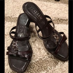 Brown open toe sandals. Wedged